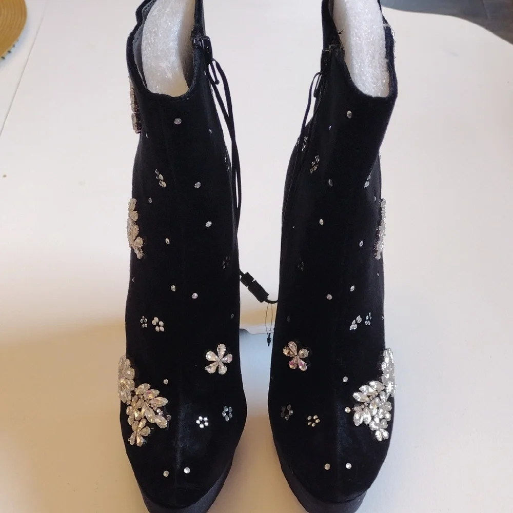Express Black Heeled Boots with Silver Embellishments - Picture 12 of 14